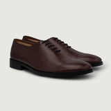 Director Wholecut Maroon Leather Shoes For Men in Maroon Full-Grain Leather - Front Profile View & Tailored Silhouette | Buy Online