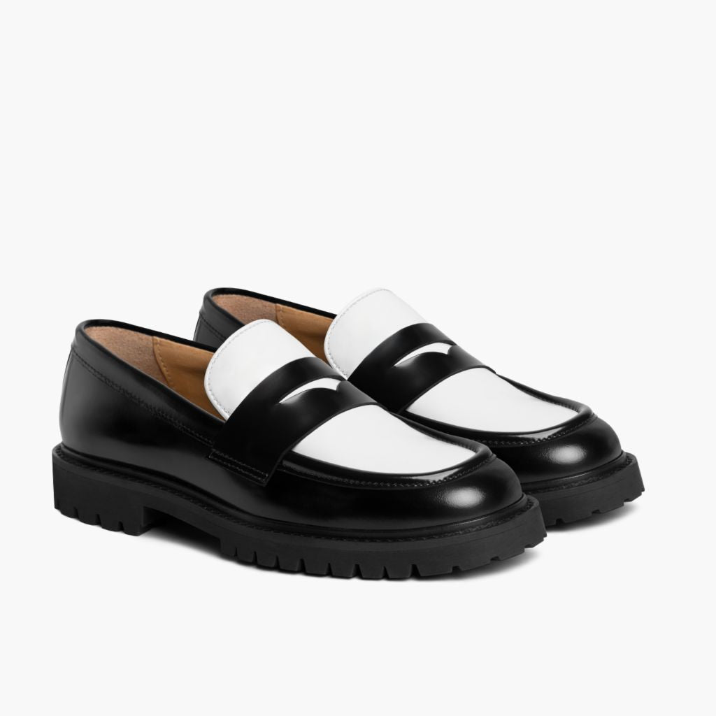 Penny Black & White Leather Loafers in Black Full-Grain Leather - Lateral Side Profile View | Buy Online