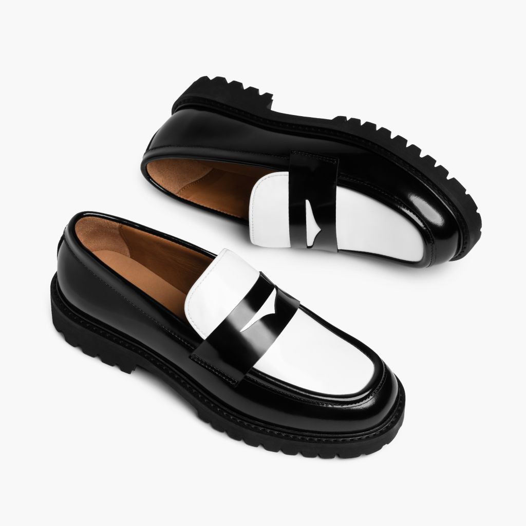 High-Traction Rubber Outsole & Lug Tread Pattern on Penny Black & White Leather Loafers
