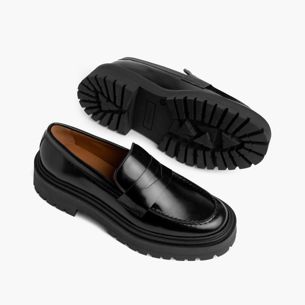 High-Traction Rubber Outsole & Lug Tread Pattern on Penny Platform Black Leather Loafers