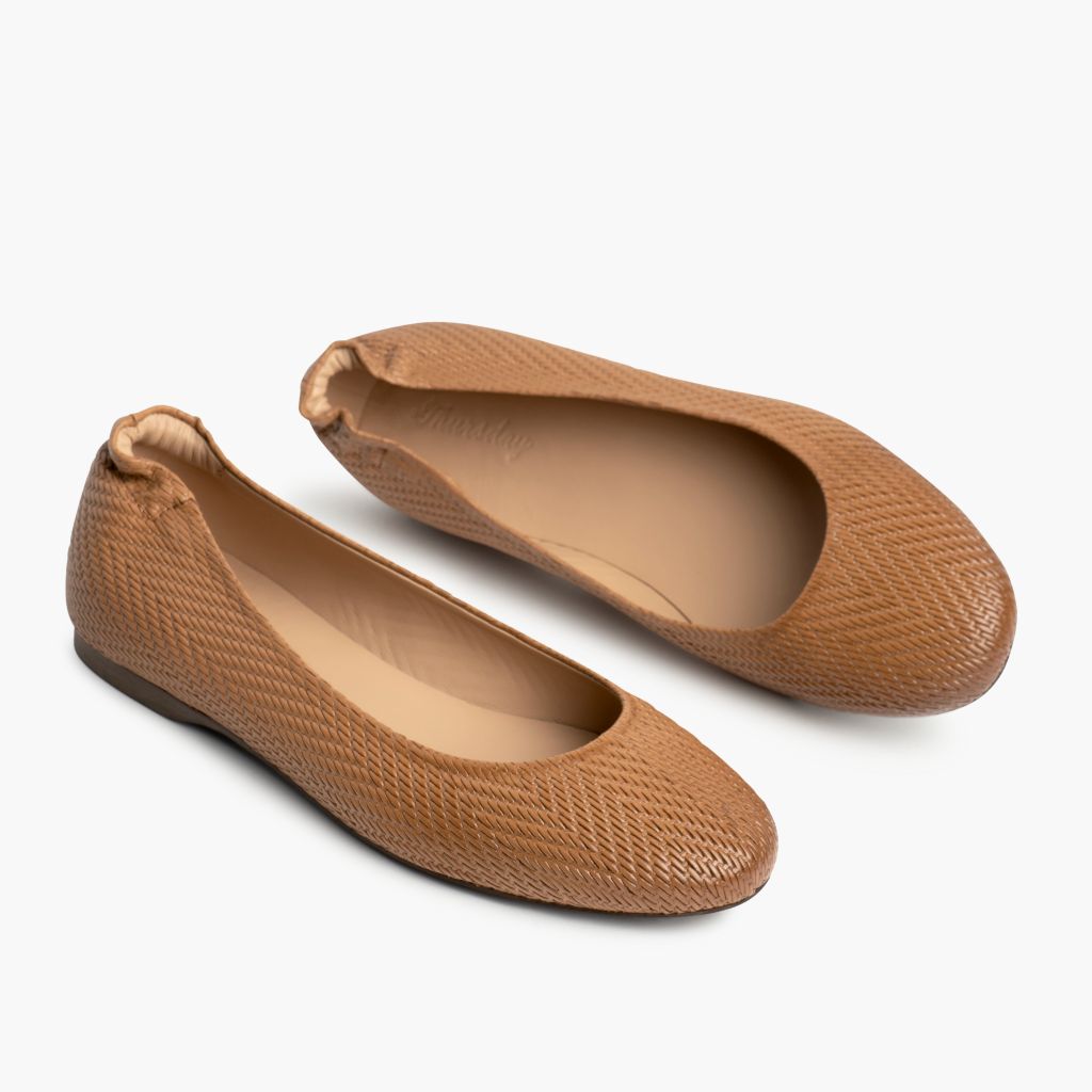 High-Traction Rubber Outsole & Lug Tread Pattern on Scrunch Tan Embossed Leather Boots