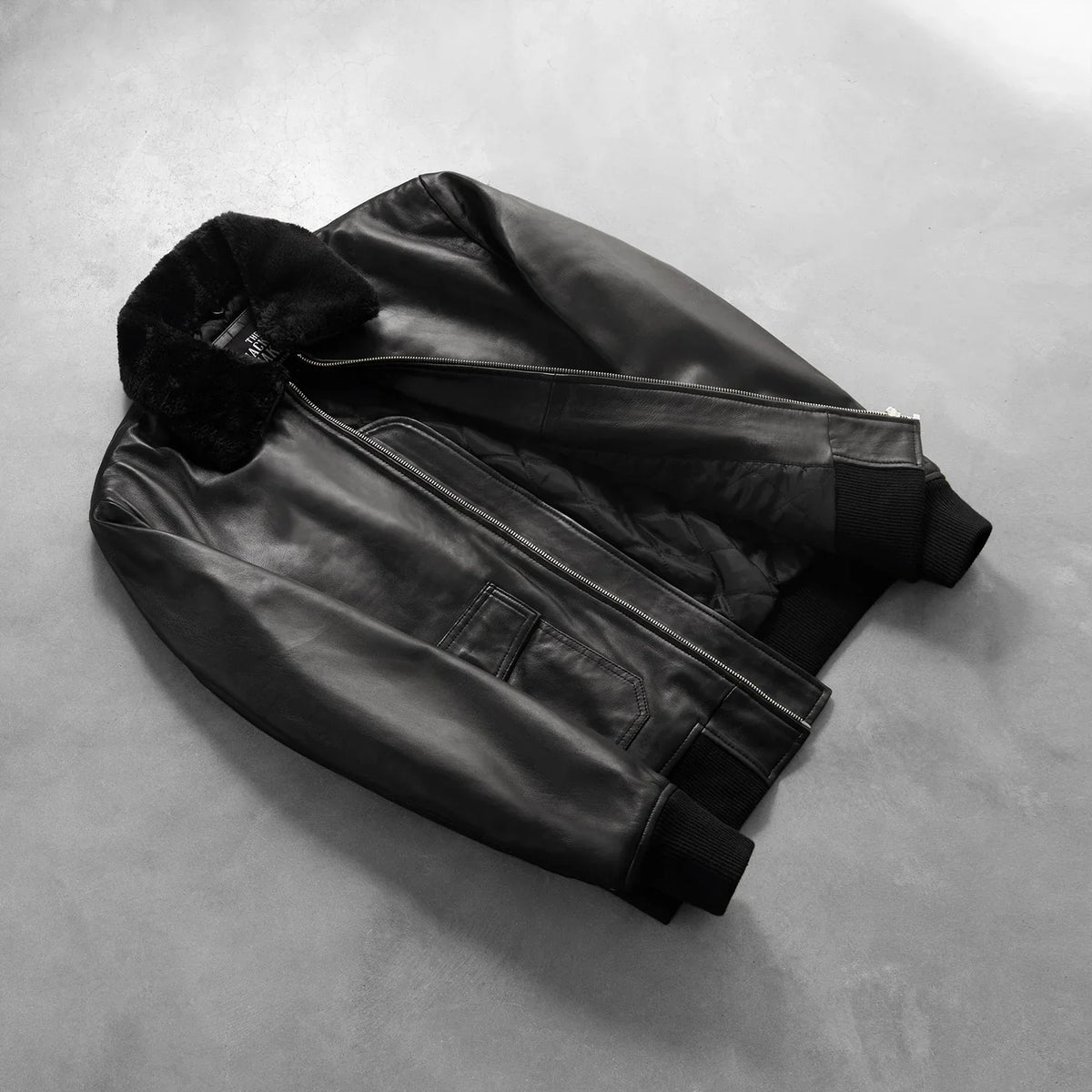 
Styled Fit Perspective of Airin G-1 Black Leather Bomber Jacket on Model - Natural Daylight Drape