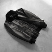 
Styled Fit Perspective of Airin G-1 Black Leather Bomber Jacket on Model - Natural Daylight Drape