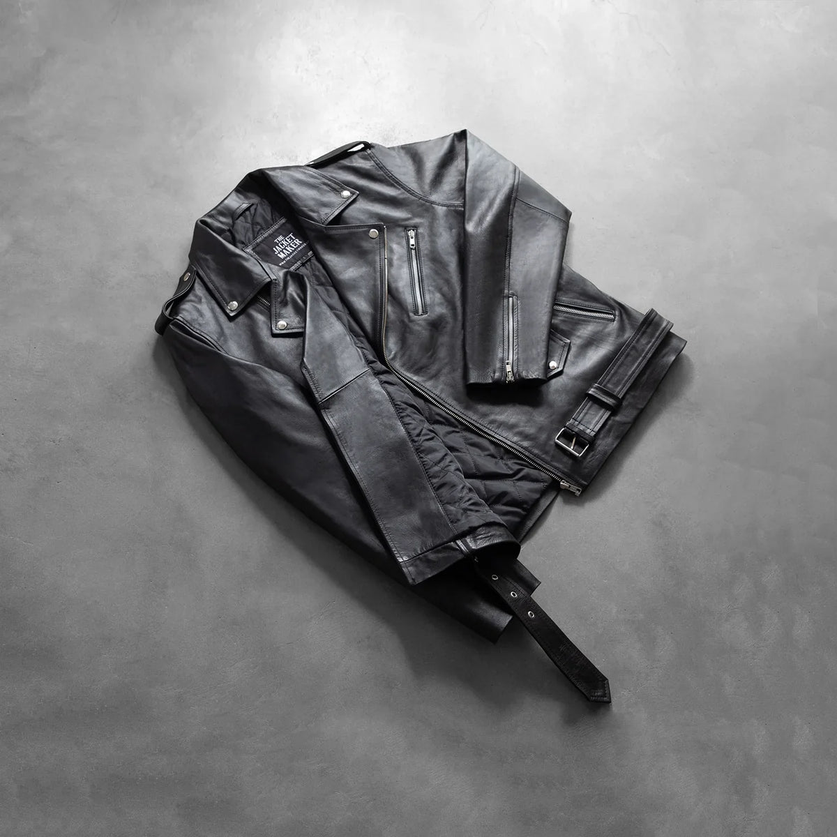 
Zipper & Hem Craftsmanship Construction Detail on Allaric Alley Black Leather Biker Jacket