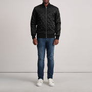 Close-Up Detail of Varsity &amp; Zipper Hardware on Danson Quilted Svart Varsity Skinnjakke for Herre