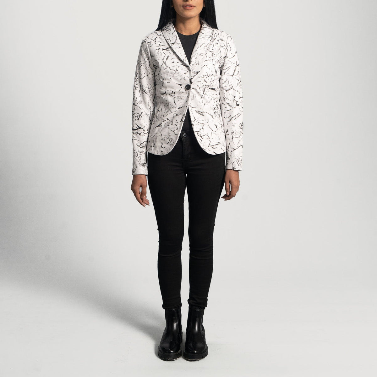 
Close-Up Detail of Notch & Button Hardware on Donna Blake White Leather Blazer