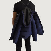 Close-Up Detail of Classic Collar &amp; Zipper With Wind Flap Hardware on Erico Blue Hooded Puffer Skinnjakke for Herre