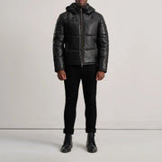 
Gordon Tan Hooded Leather Puffer Jacket - Lateral Side Profile View Showing Sleeve Cut & Athletic Taper Fit