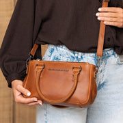 Styled Fit Perspective of Fenja Full-Grain Leather Handbag for Kvinner on Model - Natural Daylight Drape