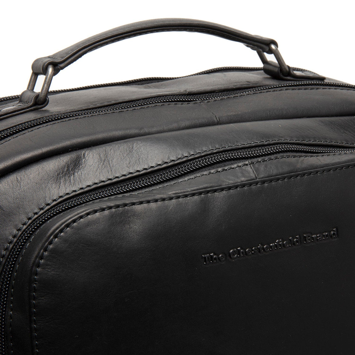 100% Full-Grain Wax Pull-Up 100% Full-Grain Leather Grain Texture & Handcrafted Patina Detail