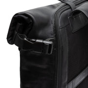
Solid Antique Brass Hardware & Heavy-Duty Dual Zipper Detail on Bornholm Full-Grain Leather Roll-top Backpack