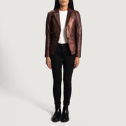 
Close-Up Detail of Notch & Button Hardware on Ruby Metallic Maroon Leather Blazer