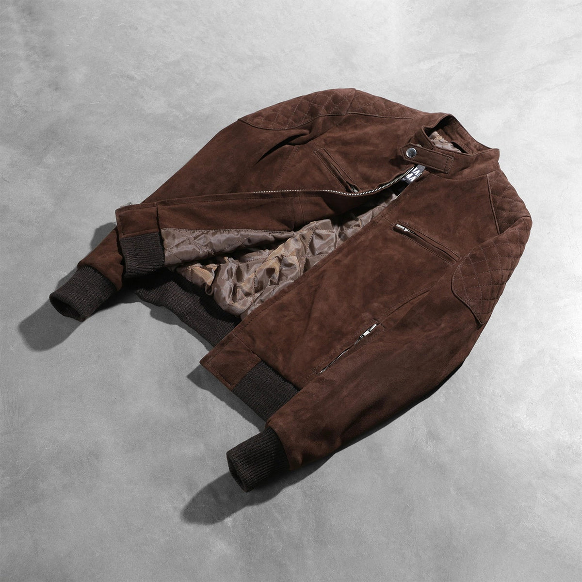 
Styled Fit Perspective of Zenna Mocha Suede Bomber Jacket on Model - Natural Daylight Drape